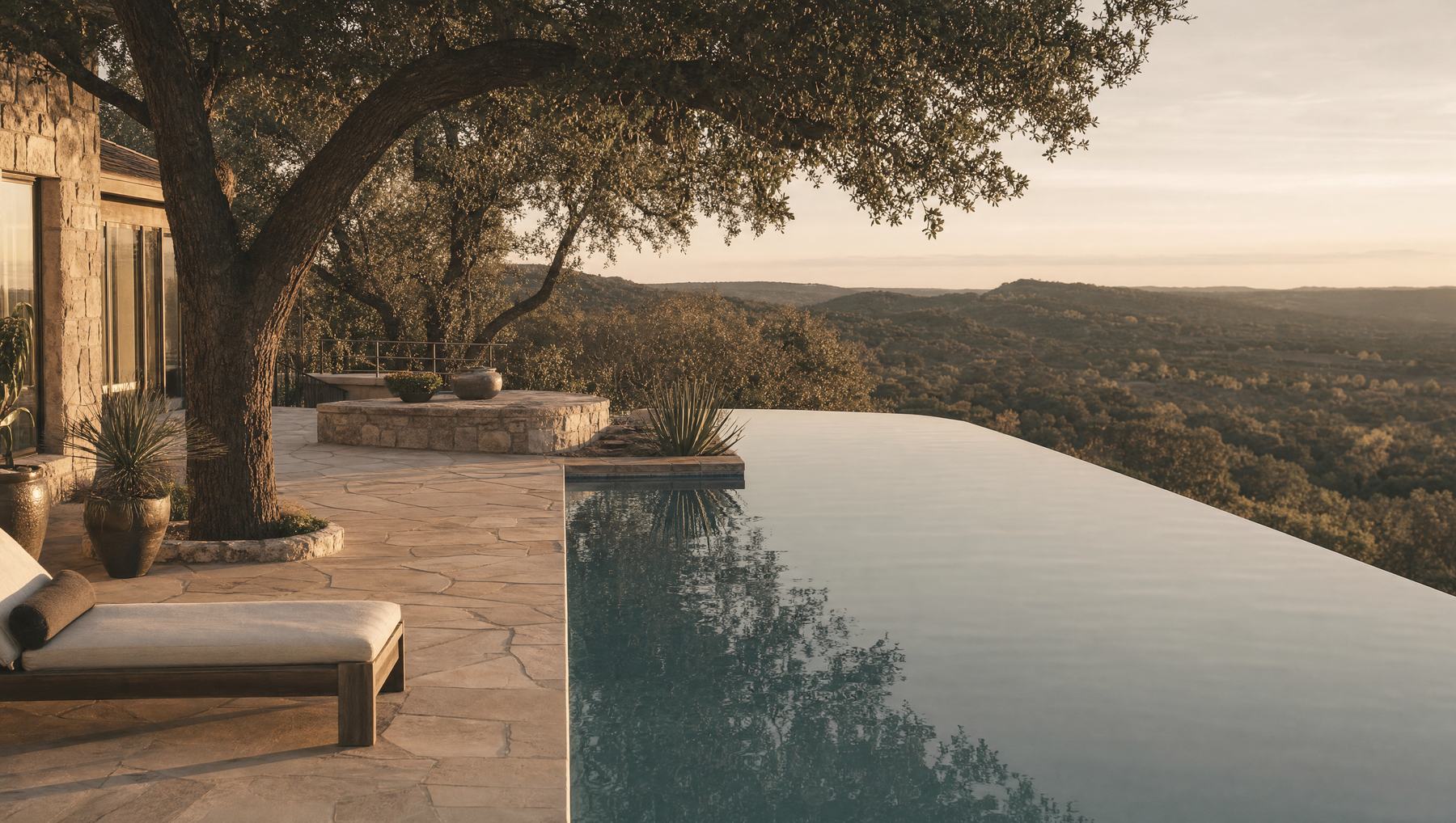 The Ledge · A ridge lot asked for a horizon. Sixty feet of vanishing edge answered.
